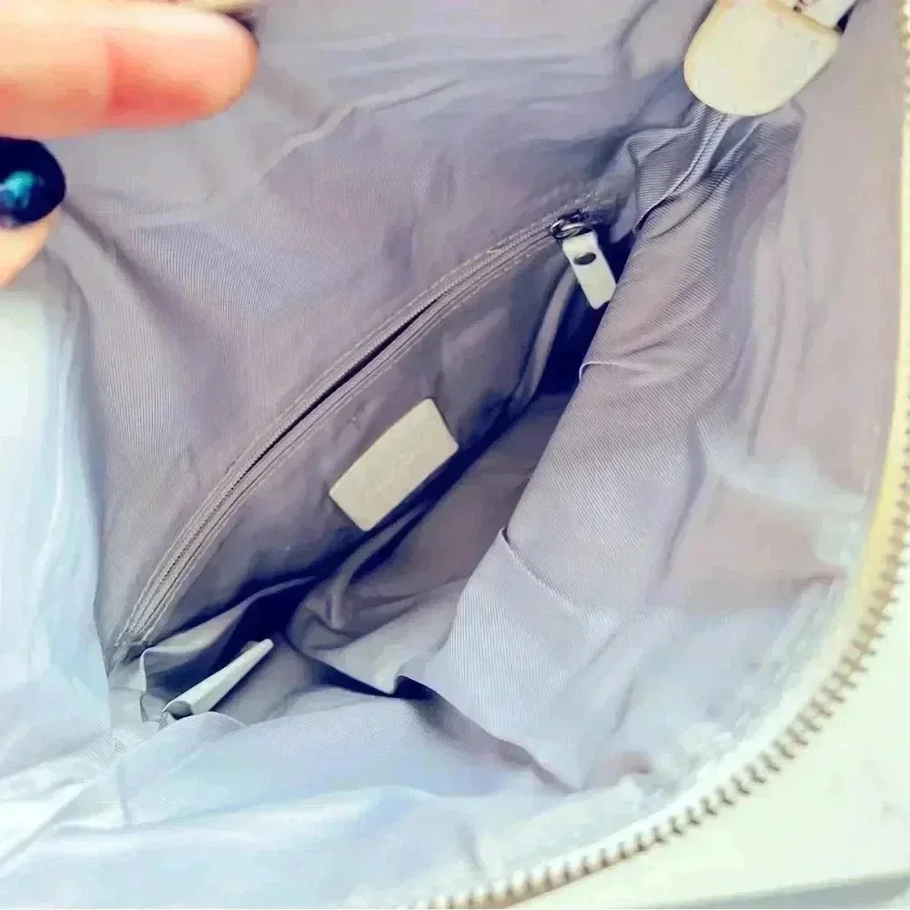 Nixon Leather White and Silver Foldable Clutch